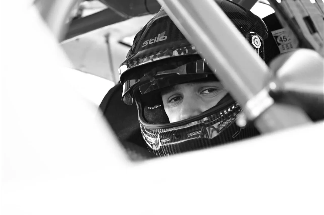 Racing driver focused inside the cockpit