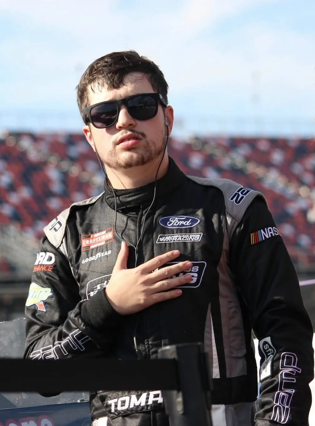 Tyler Tomassi in his Tomassi Racing firesuit on the NASCAR grid