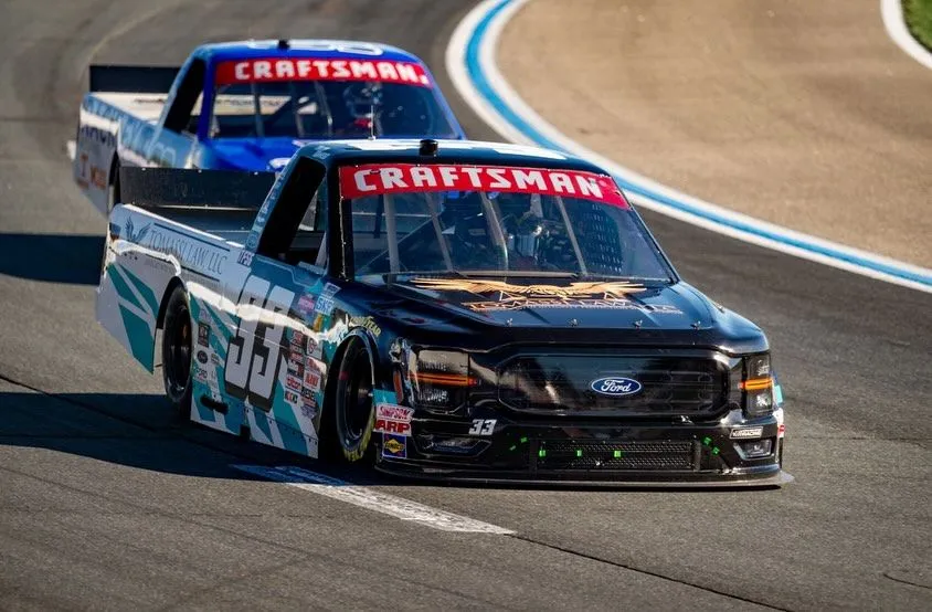 The No. 33 truck racing through a corner